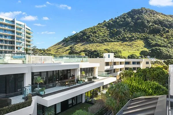 Modern balcony apartments with mountain views at Pavilion Beachfront Apartments, Mount Maunganui.